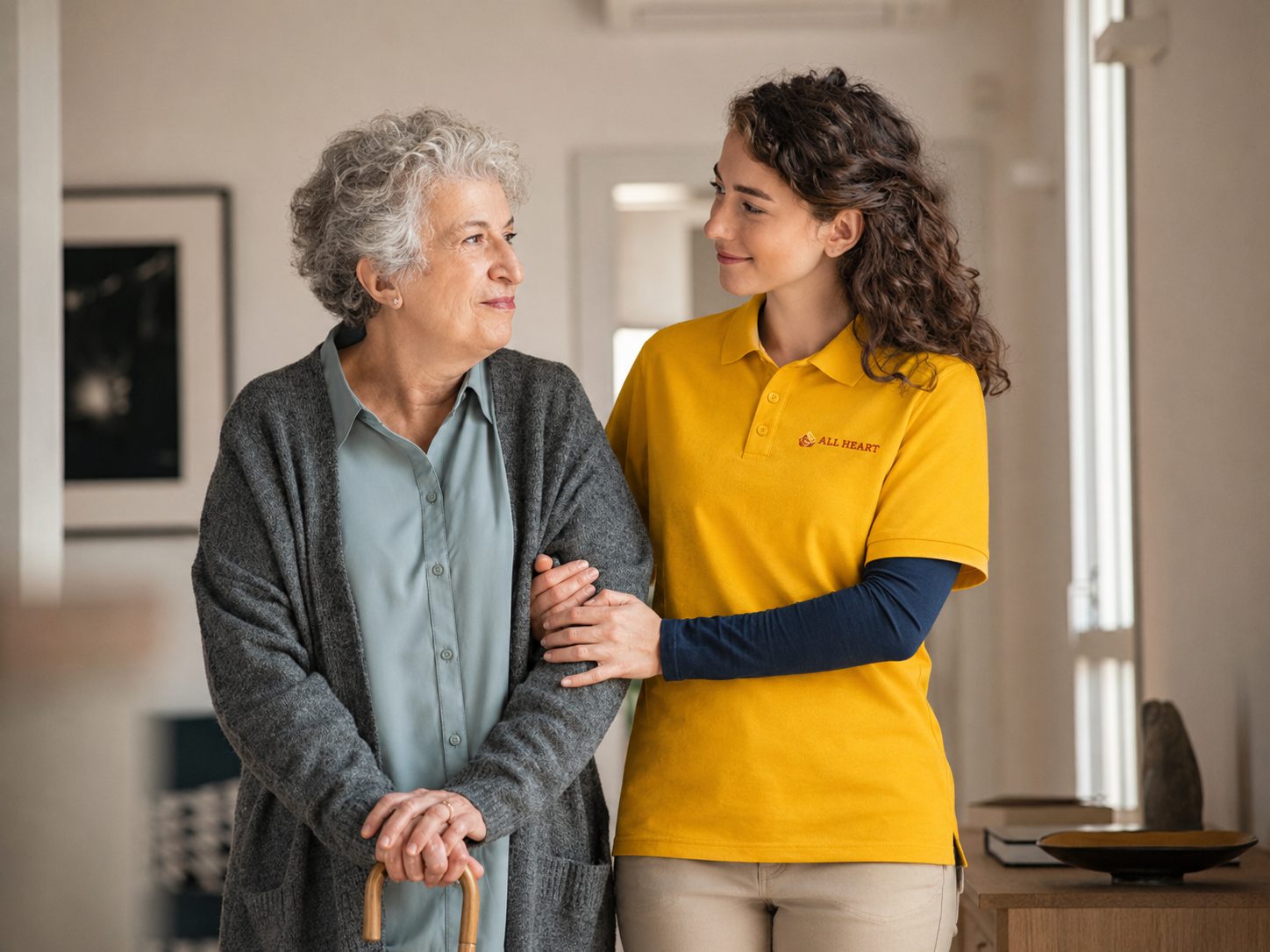 All Heart care worker supporting a client at home
